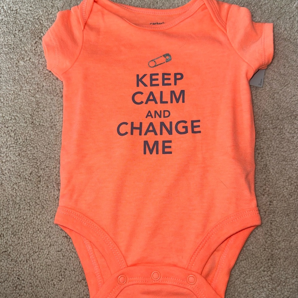 Brand new peach/ orange onesie